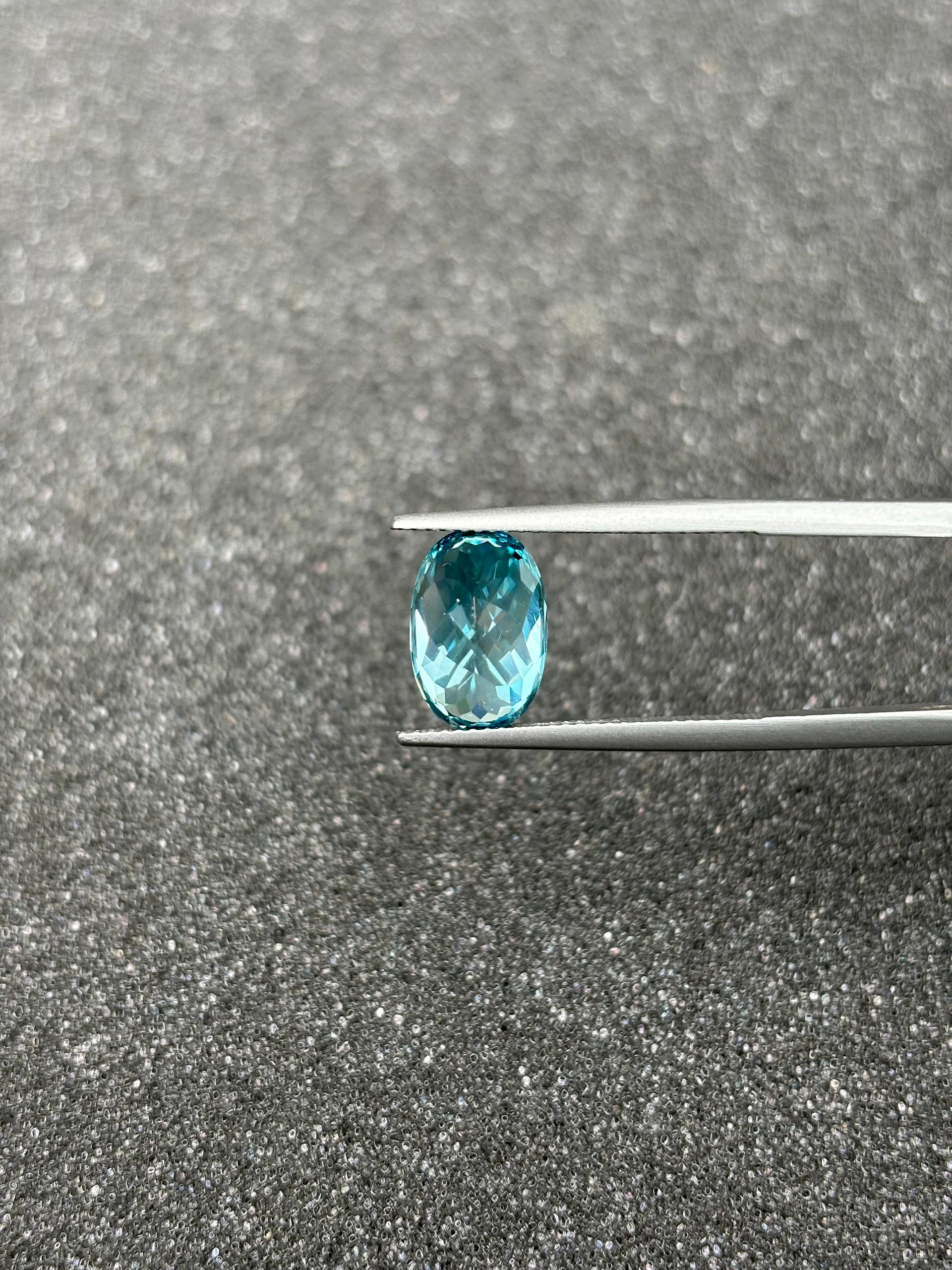 blue blue zircon, 6.47ct oval cut — view 6