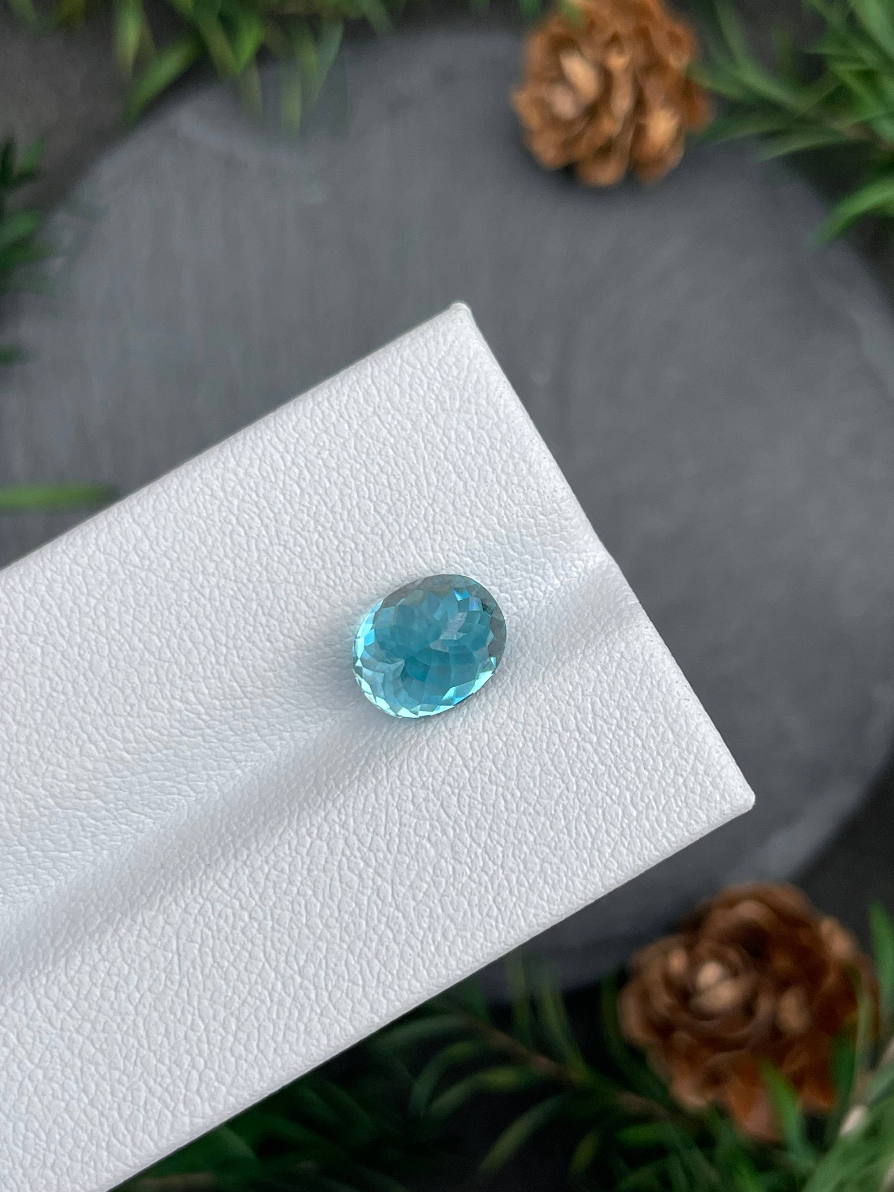 blue blue zircon, 4.25ct oval cut — view 7