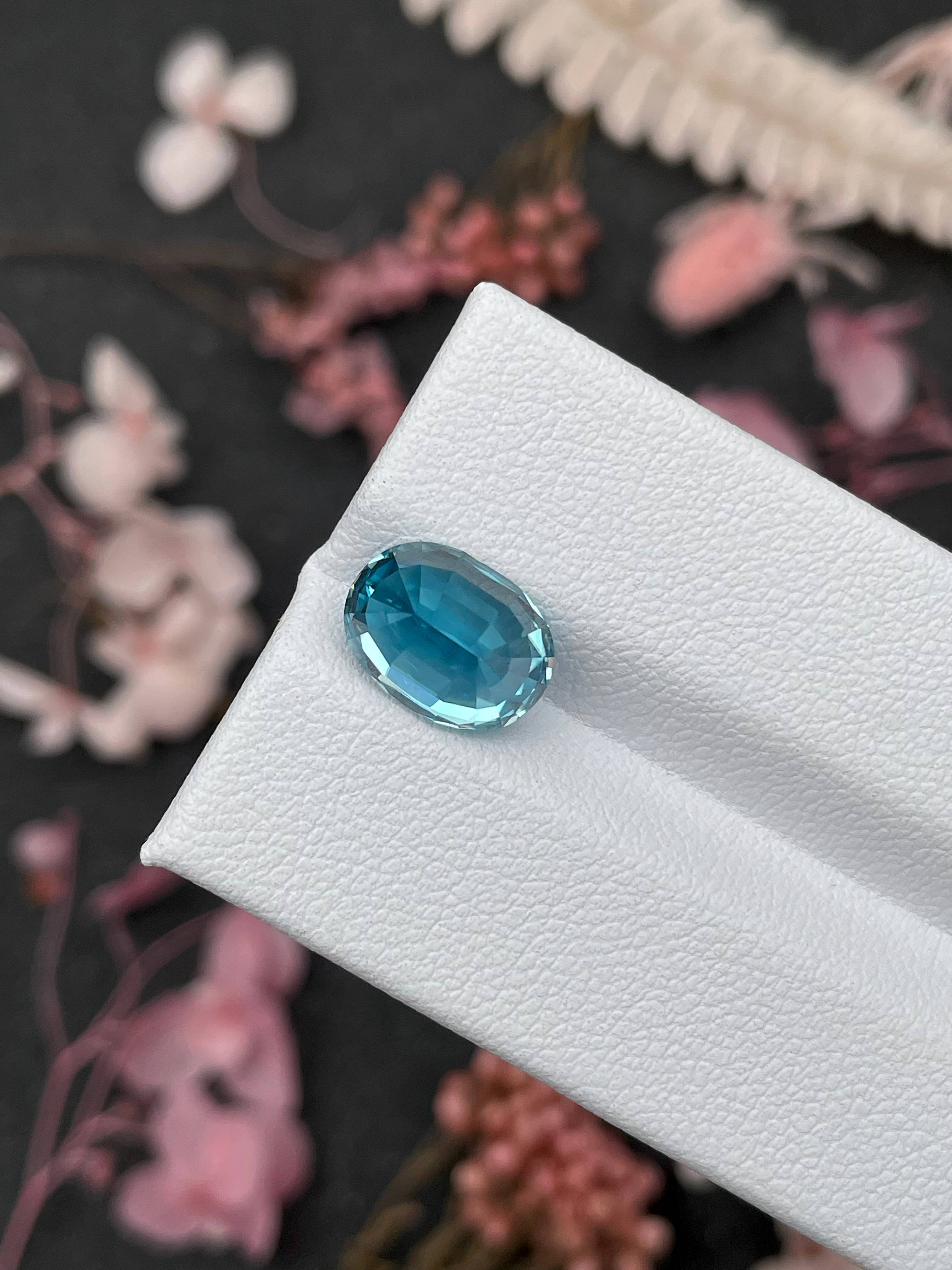 blue blue zircon, 5.67ct oval cut — view 6