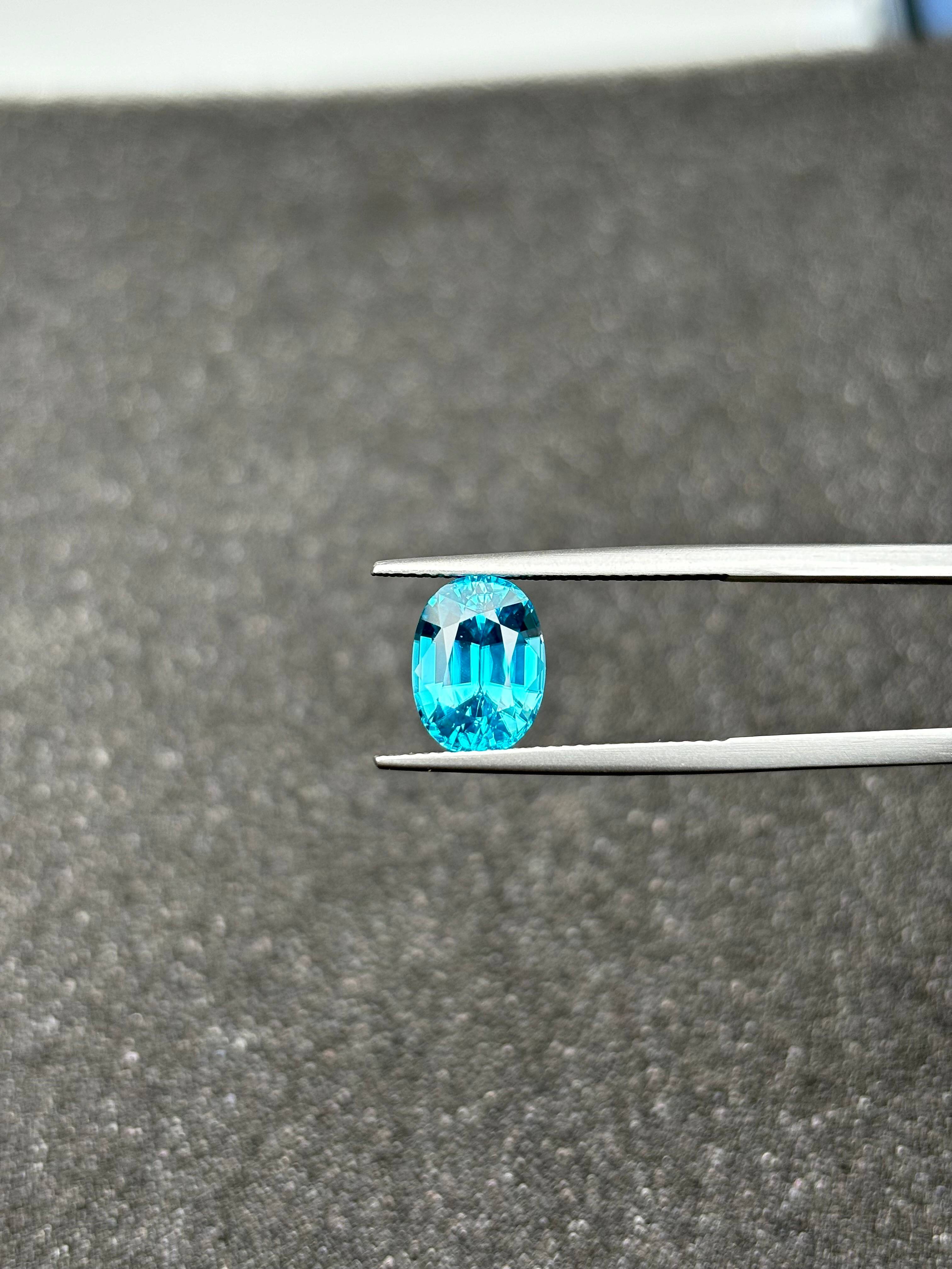 blue blue zircon, 5.67ct oval cut — view 7