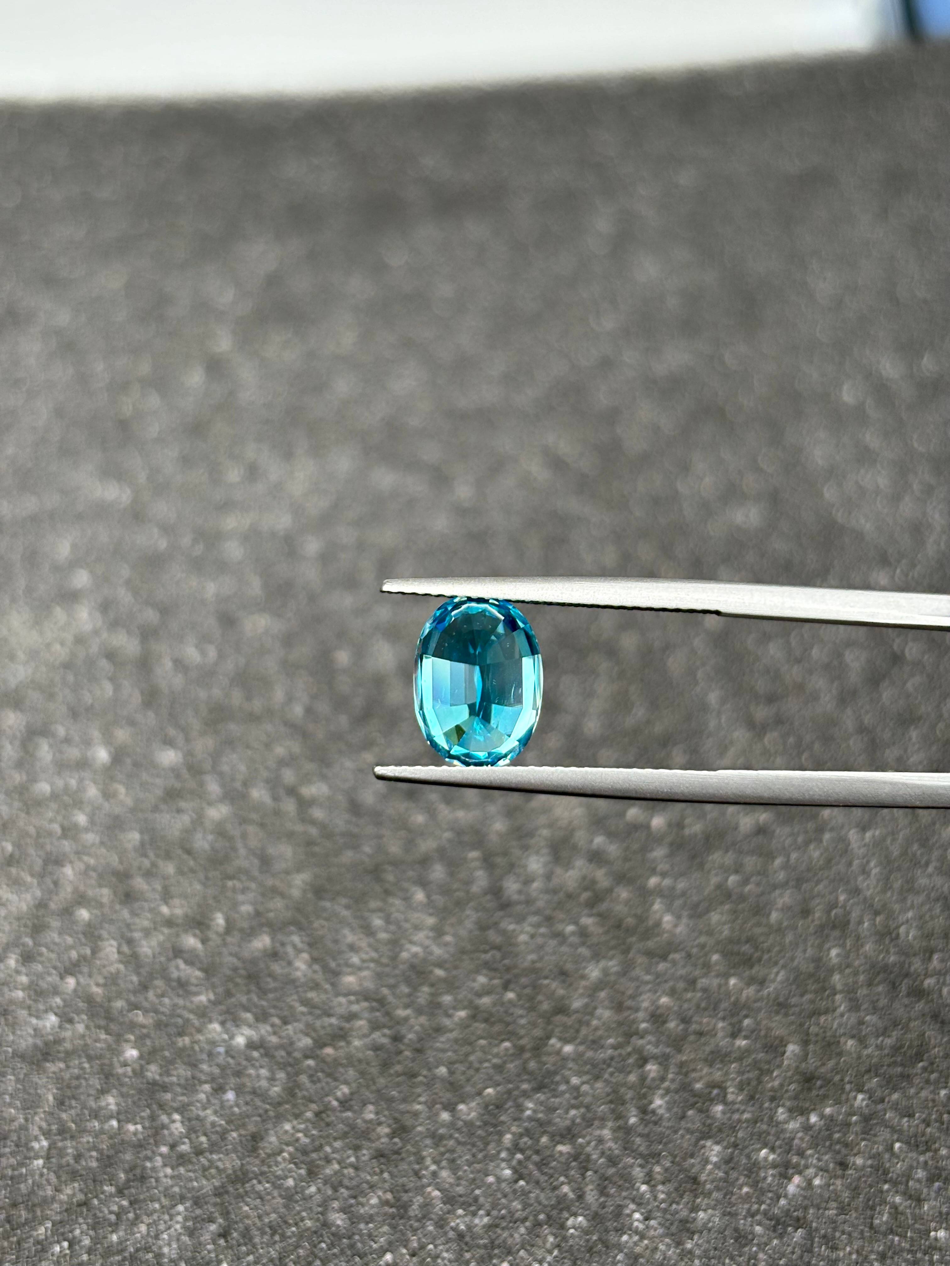 blue blue zircon, 5.67ct oval cut — view 8