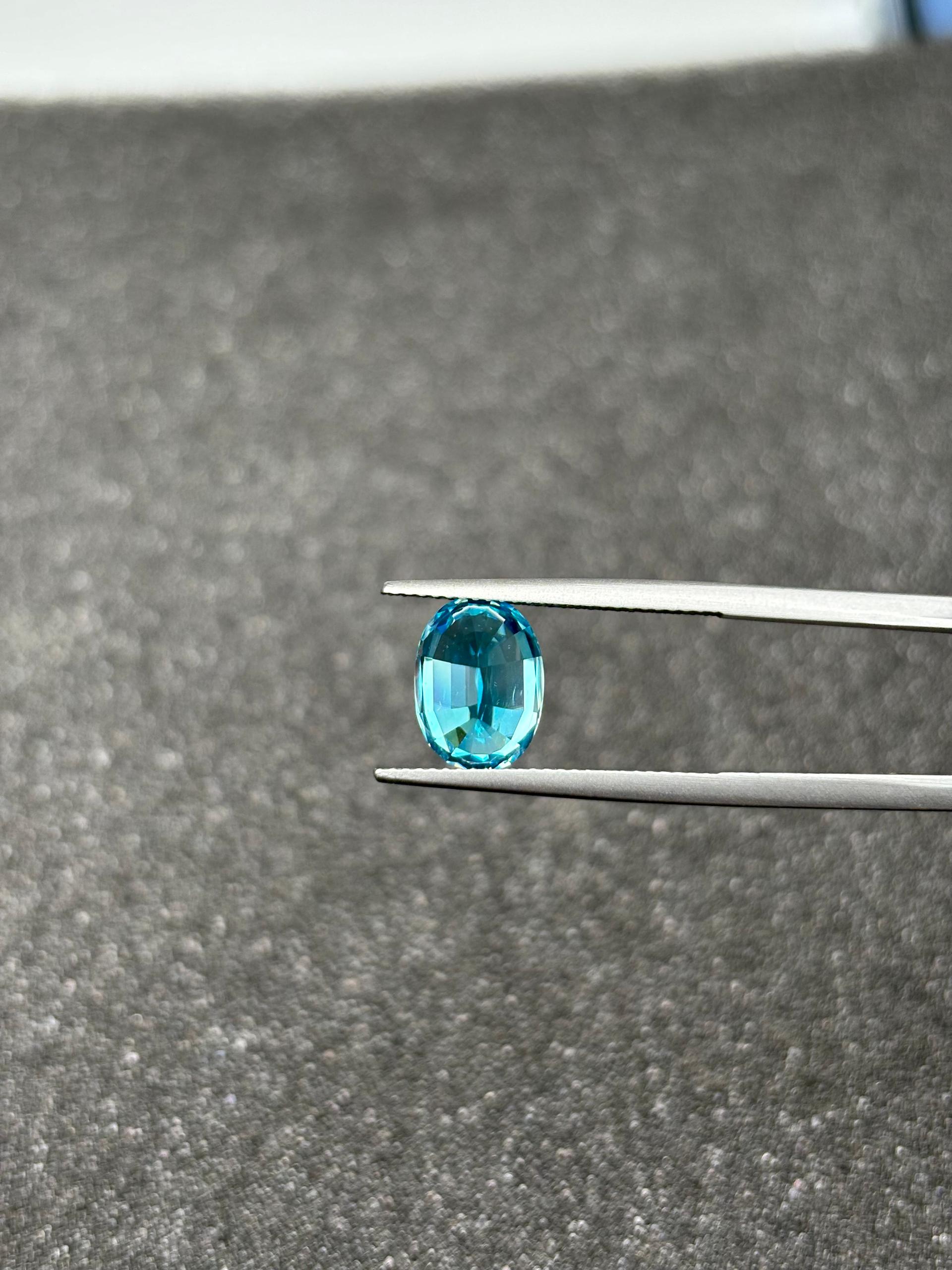 blue blue zircon, 5.67ct oval cut — view 8