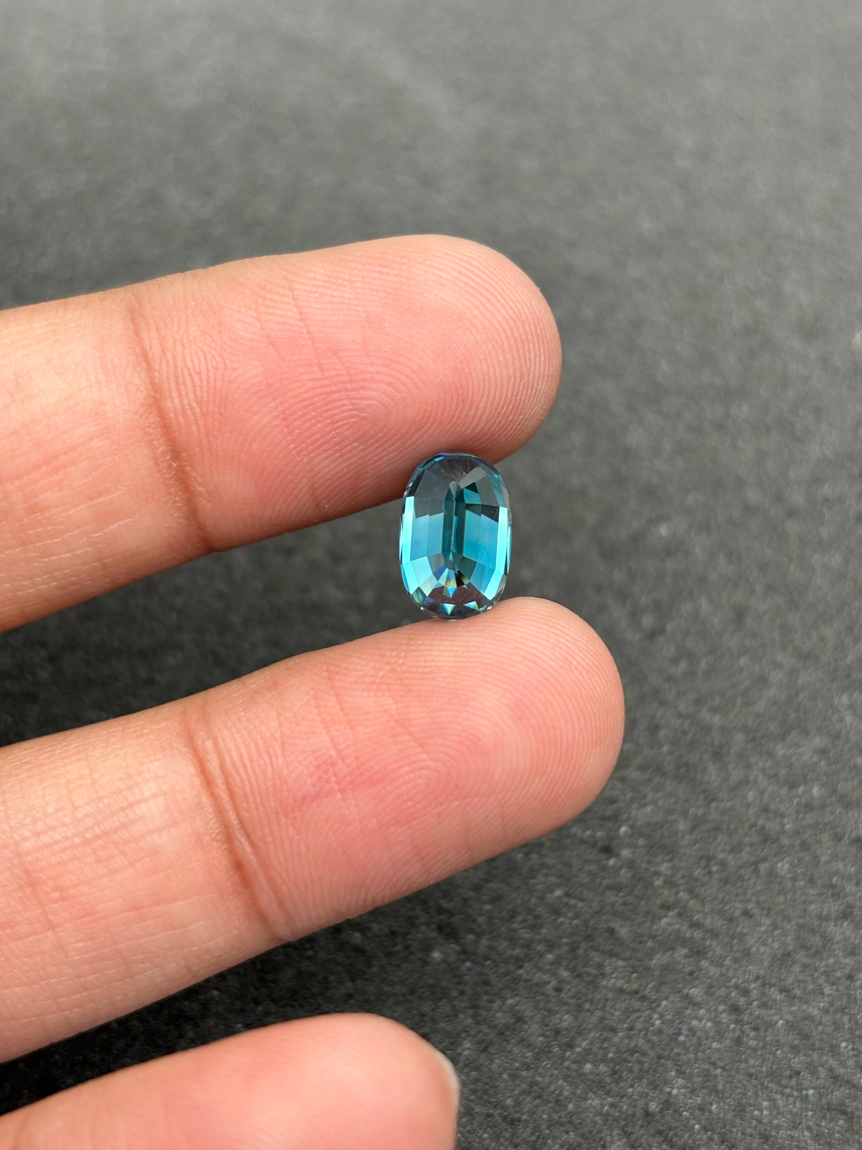 blue blue zircon, 5.05ct oval cut — view 6