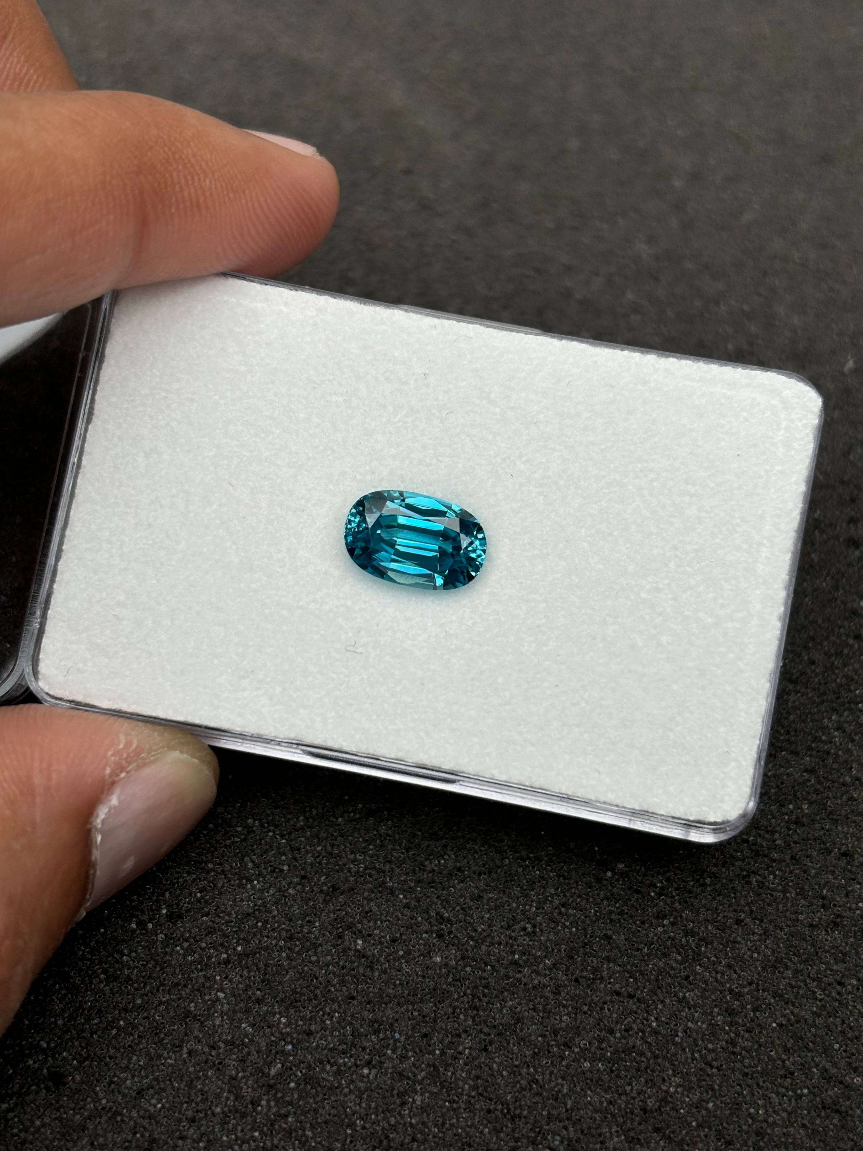 blue blue zircon, 5.05ct oval cut — view 7
