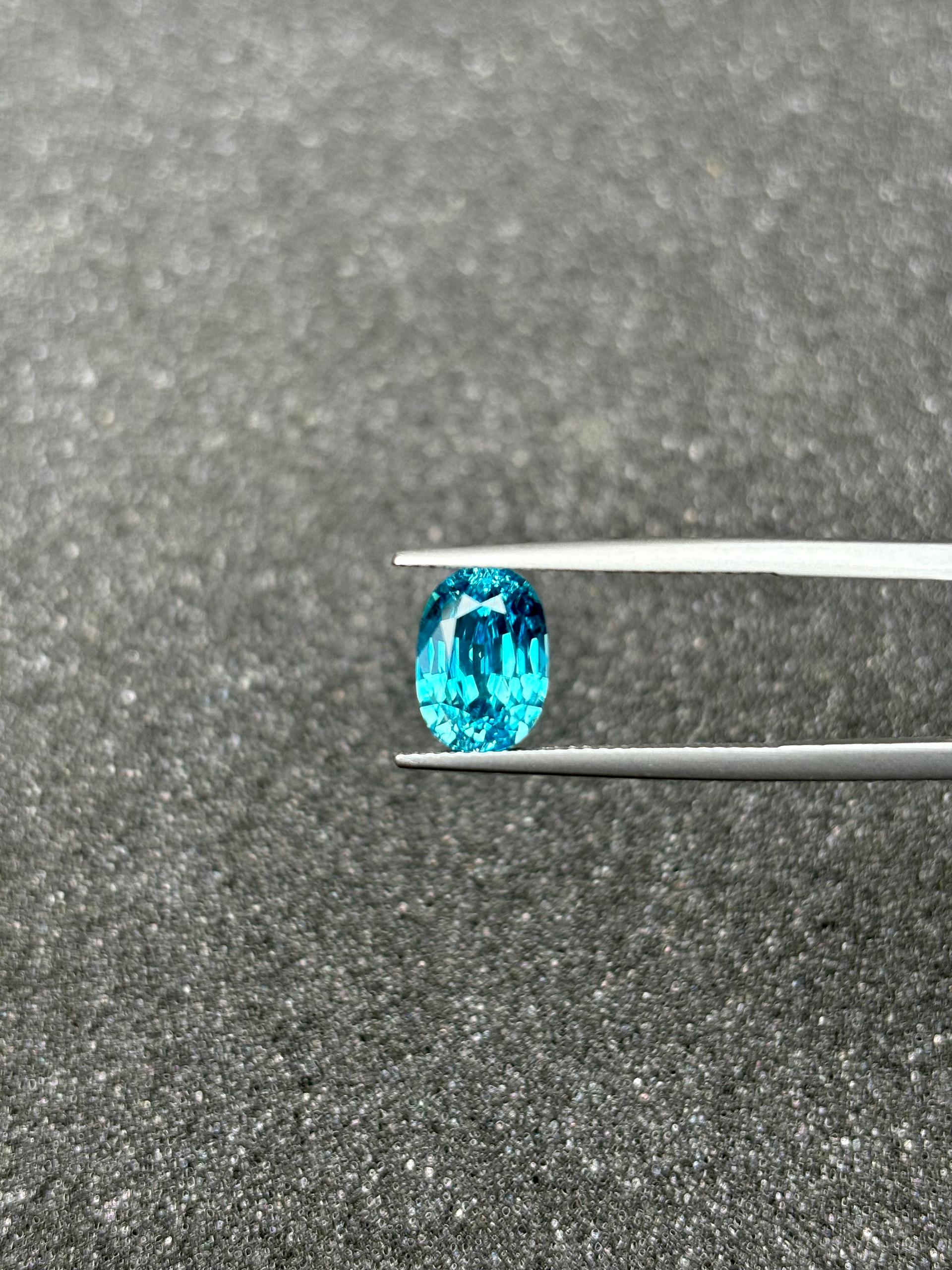blue blue zircon, 5.32ct oval cut — view 6