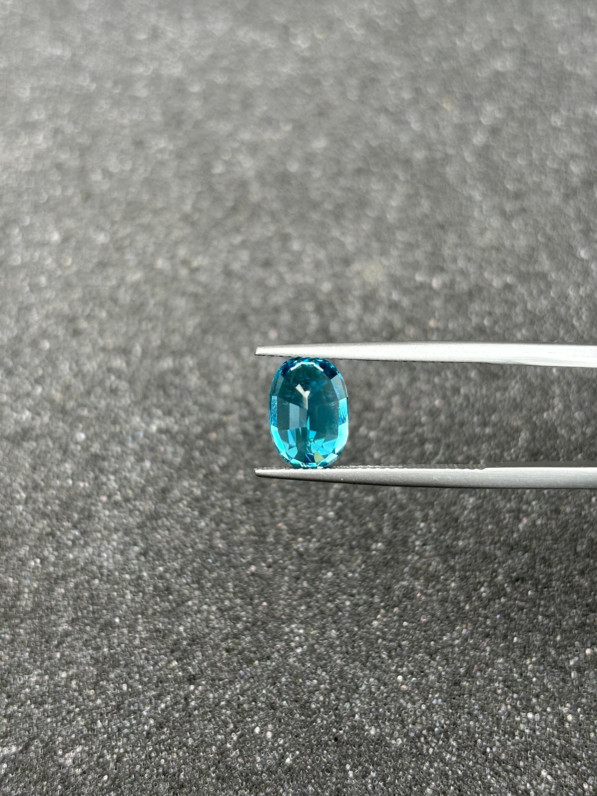 blue blue zircon, 5.32ct oval cut — view 7
