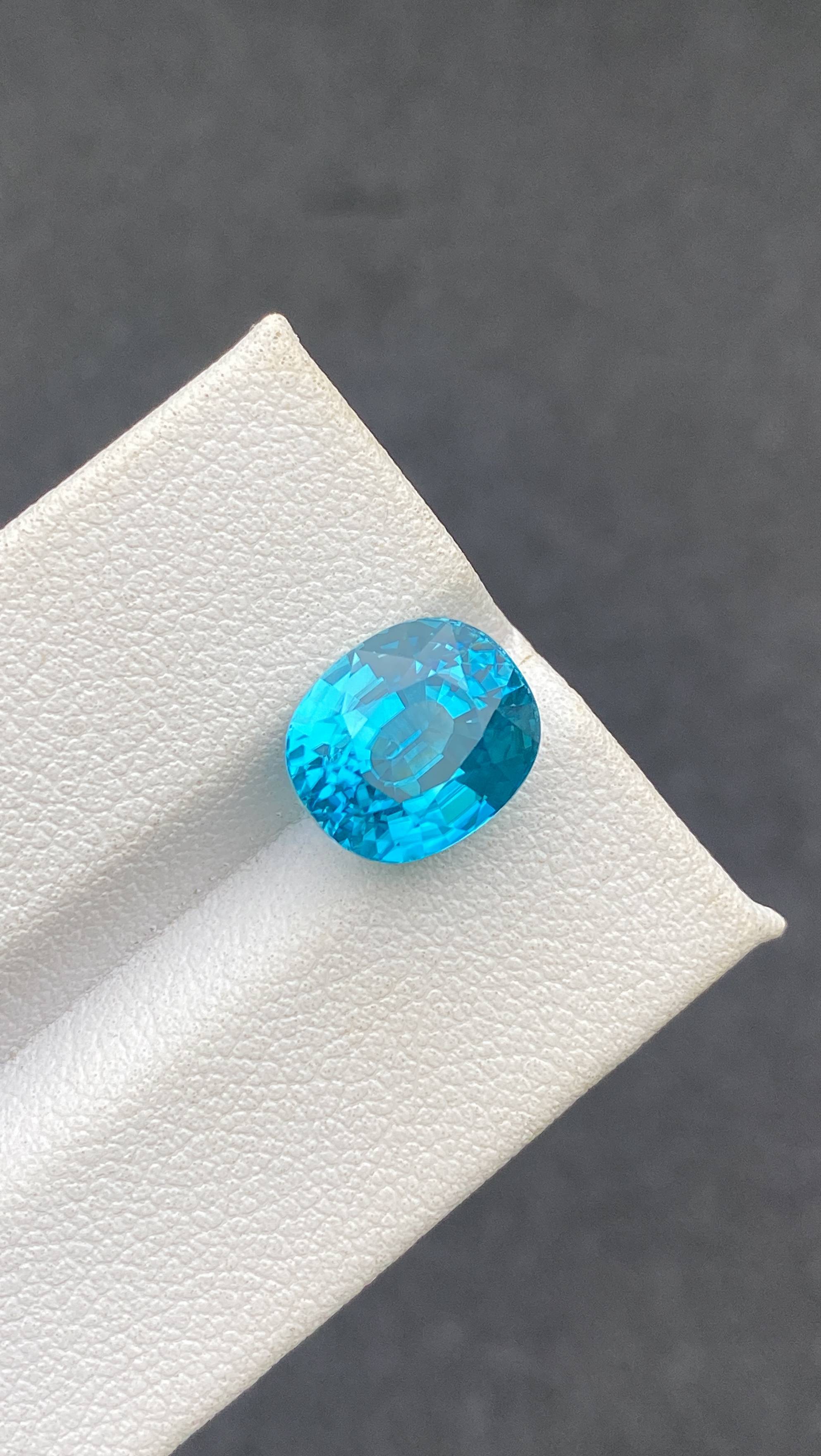 blue blue zircon, 6.92ct oval cut — view 5