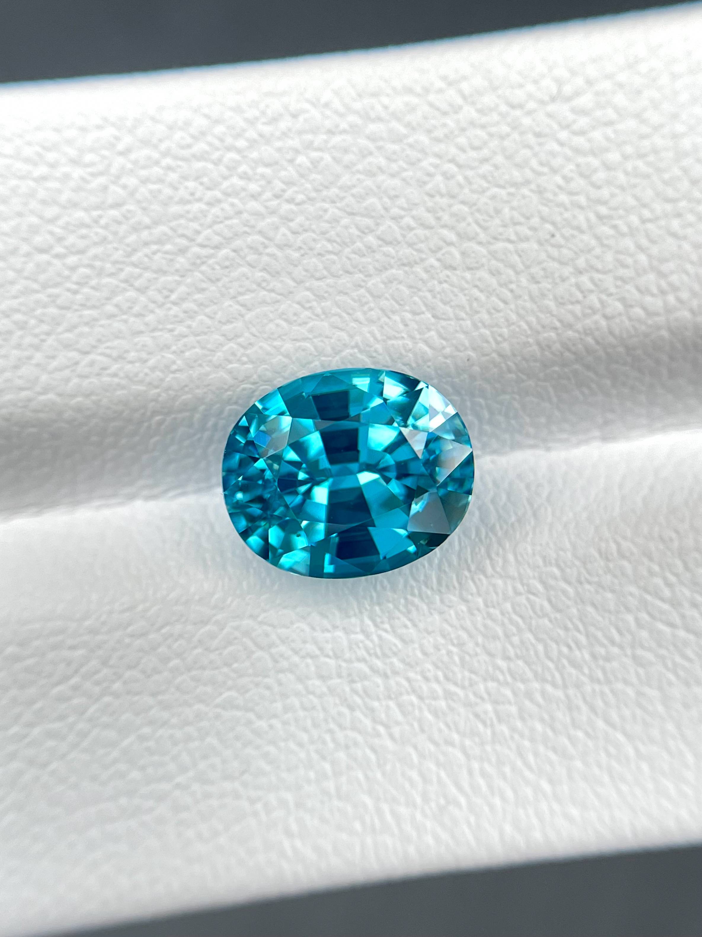 blue blue zircon, 5.28ct oval cut — view 5