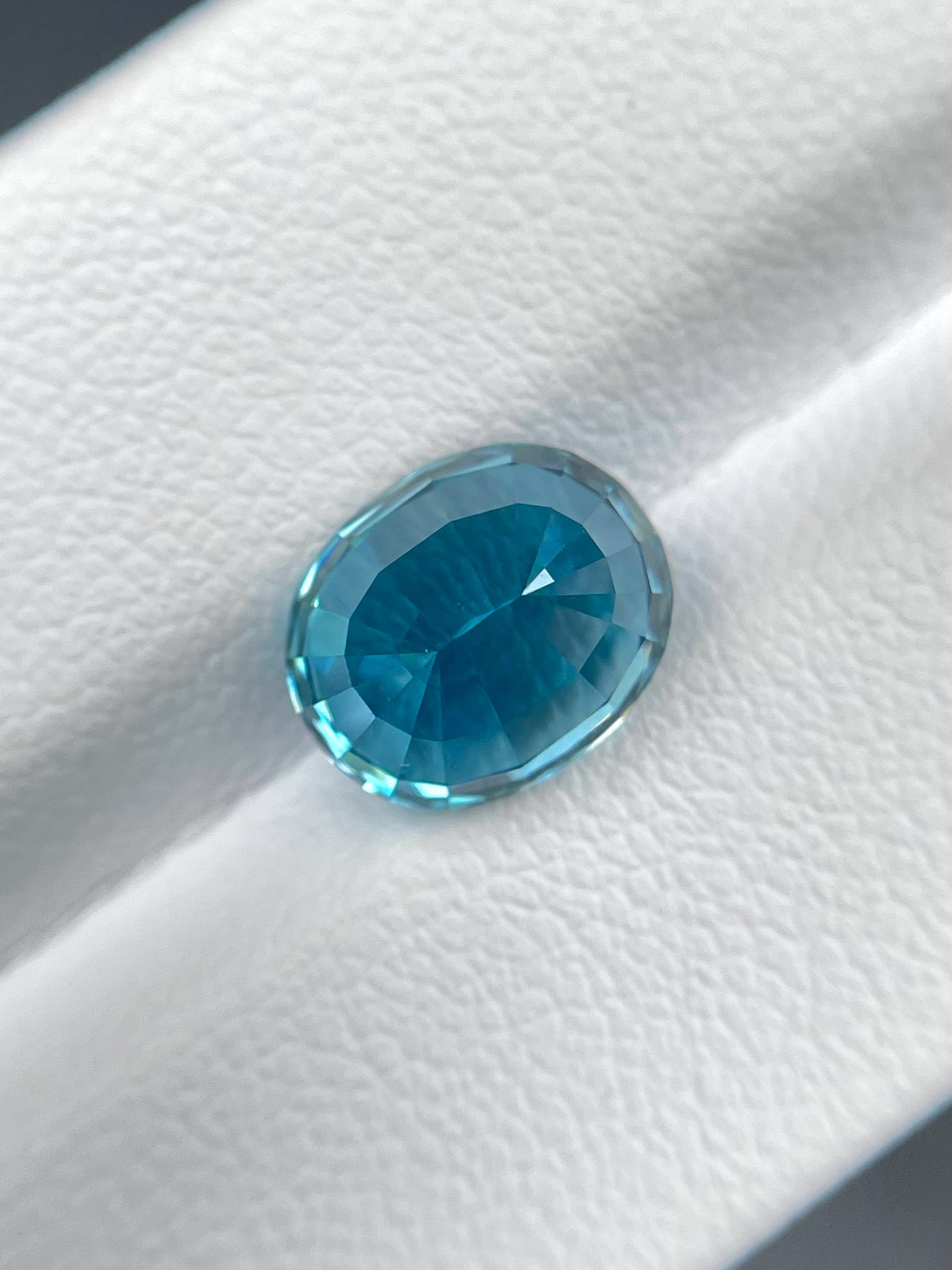 blue blue zircon, 5.28ct oval cut — view 6